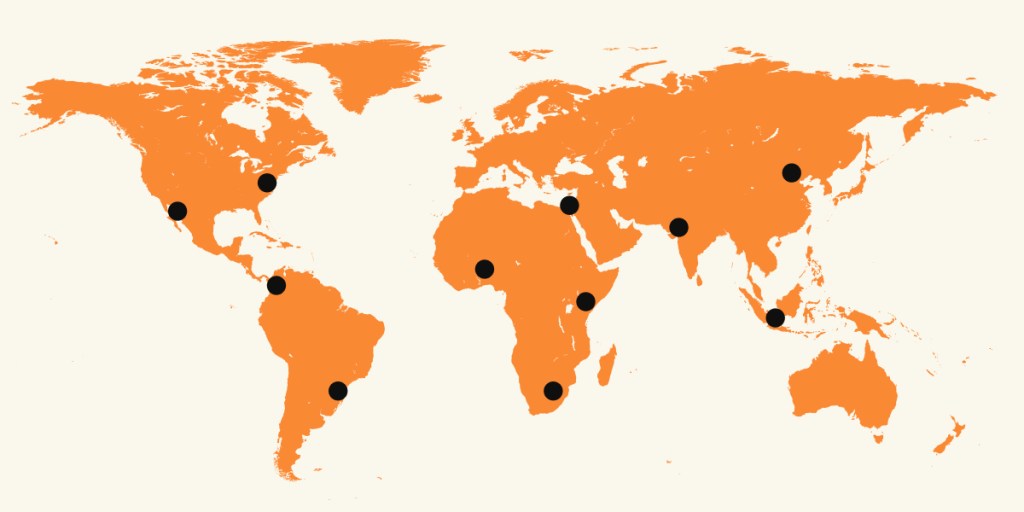 An orange and beige map of the world with black dots representing the locations of the 11 Maria Aramburuzabala Foundation offices